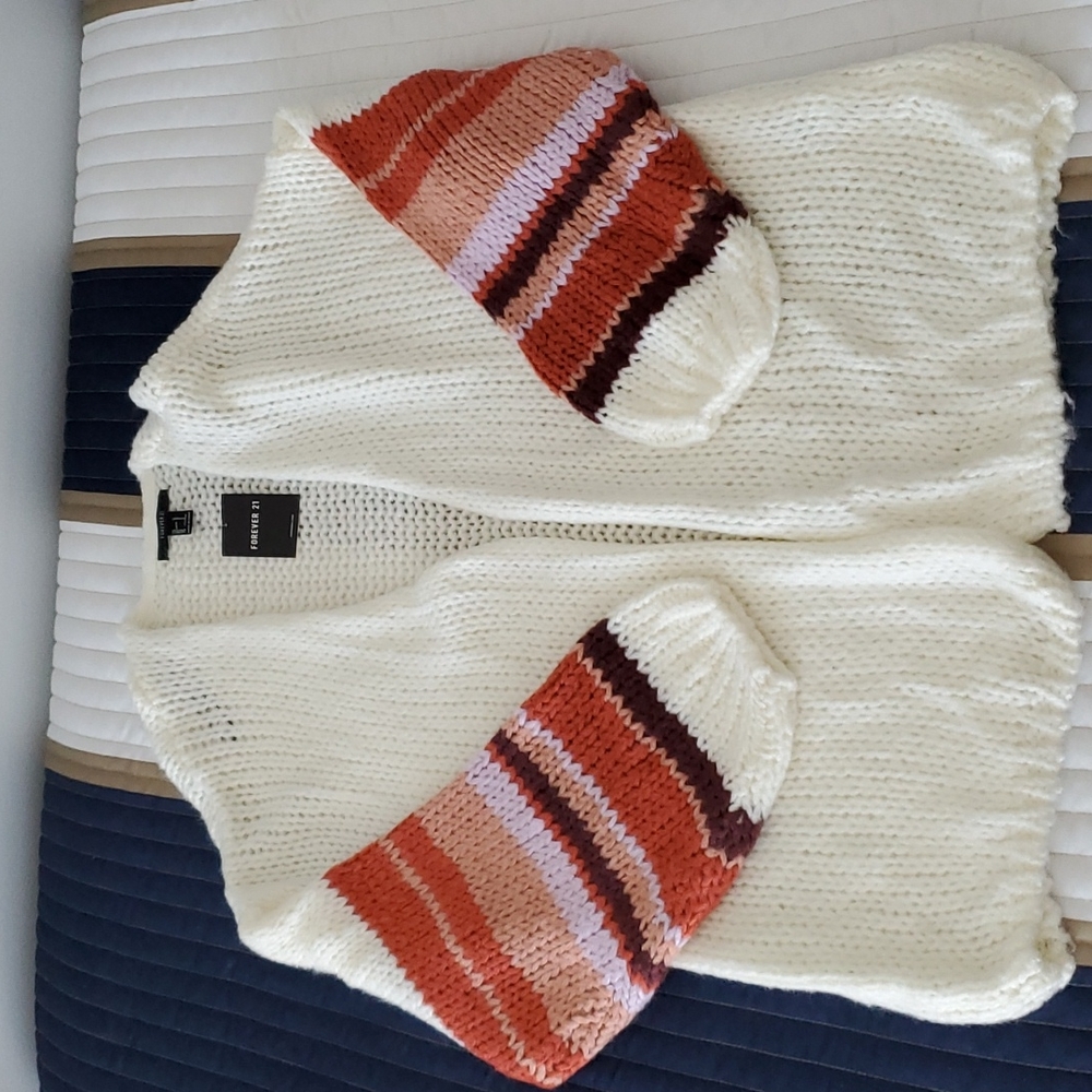 Sweater, Forever 21 size Large. white with earth tone colors on sleeves. New